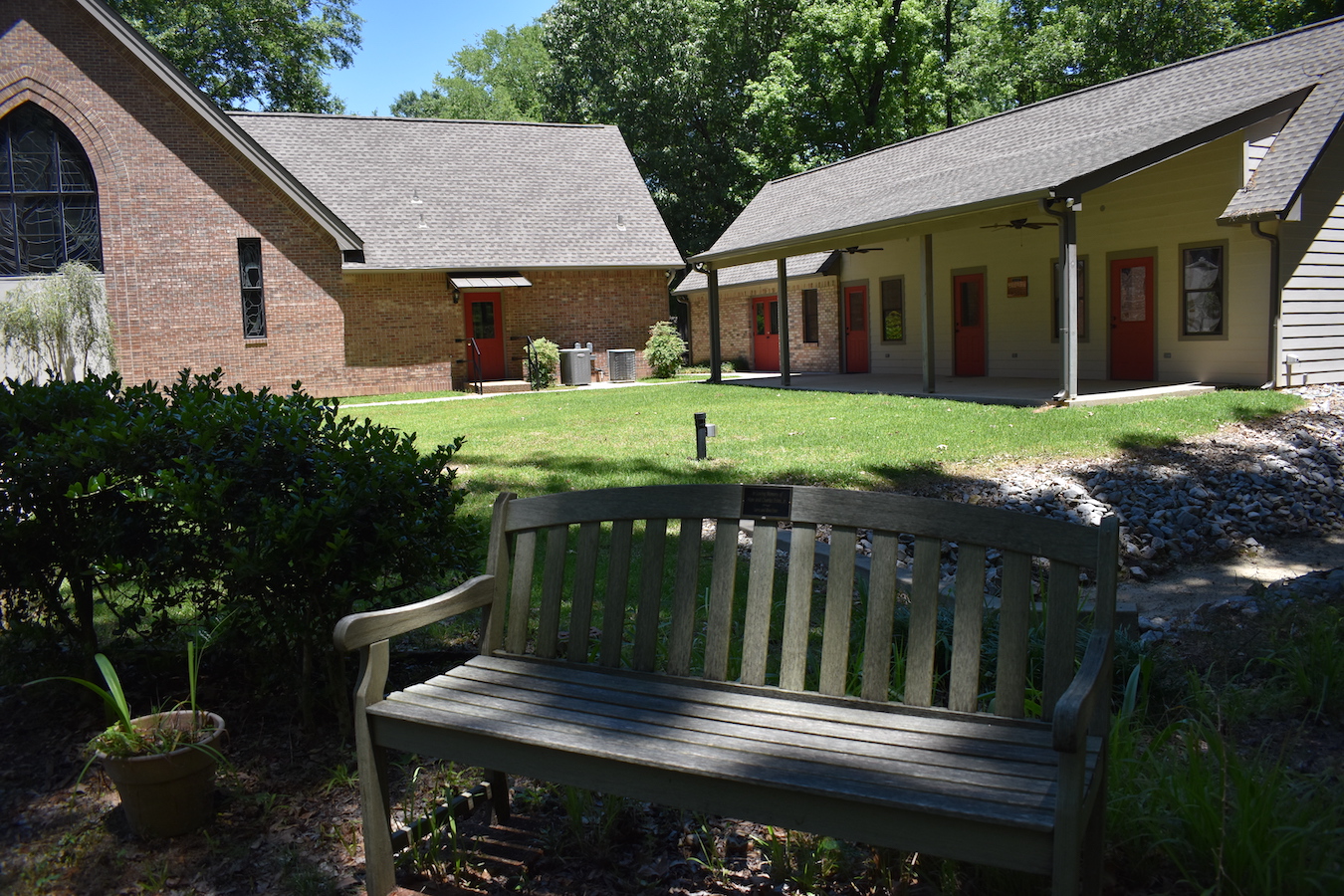 Sanctuary and CE building with bench.JPG